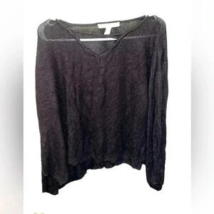 In excellent used‎ condition - Emaline black sweater in size medium!